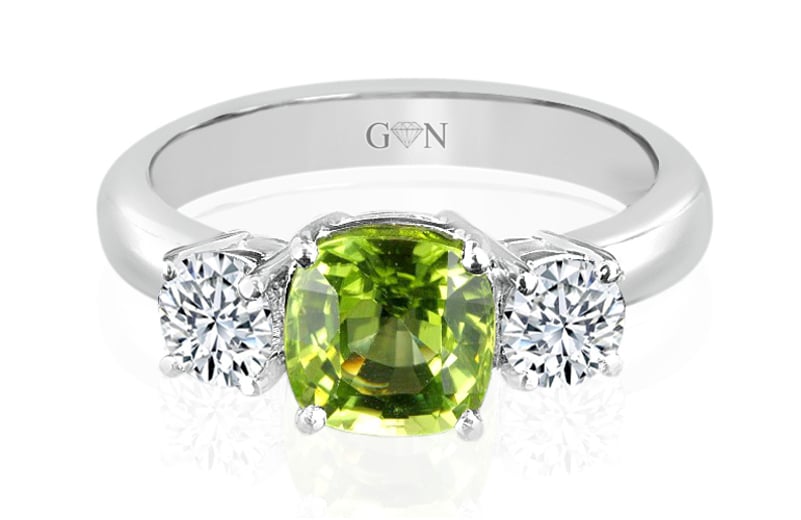 green stone gold ring design for female